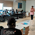 Atelier de coaching professionnel pour améliorer la cohésion d'équipe en entreprise à Dakar.